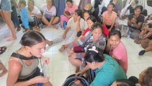 Volunteers and community members together.