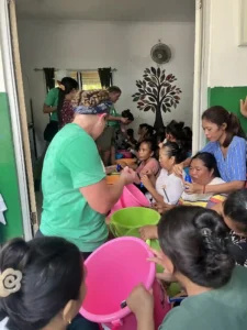 Volunteers and community members spending time together.