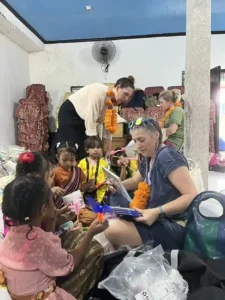 Volunteer playing with local children.