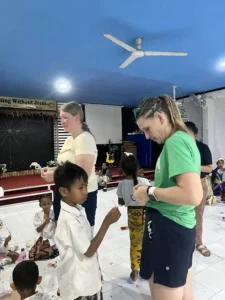 Volunteer helping a local child.