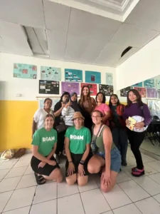 Volunteers and community members posing for a picture.